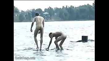 Steamy gay sex on the lake shore