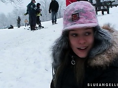 Hot teen has fun playing out in the cold snow with her cameraman