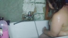 Camera in the Bathroom and a Girl with a Big Ass Is Peeing, Very Sexy