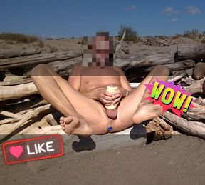 He masturbates his cock on the beach with a butt plug and a sex toy in Cap d&#039;Agde