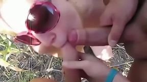 Slut milf sucks two cocks at swinger beach meeting
