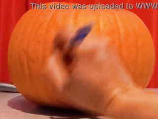 SFW Jon Arteen hot twink rock femboy carves a Halloween pumpkin in his underclothes Jack-o'-Lantern