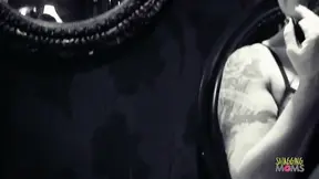 Tattooed cutie gives a fun and cheeky live blowjob