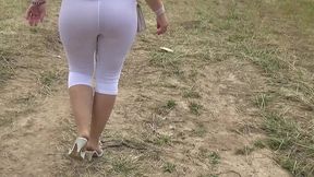 girl walking in white transparent leggings without panties