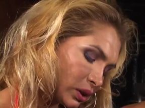 Sexy stud gets fucked in the ass by her huge cock by weight bench