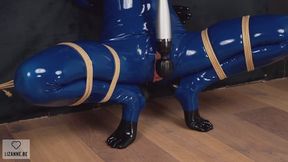 Latex doll tied up with vibrator
