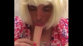 SissyBambiJones sucks a white dildo