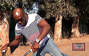 Naughty ebony teen hottie riding a bike —