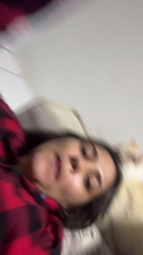 Cute girl in red plaid shirt