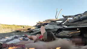 Amateur babe's pussy flash caught on beach
