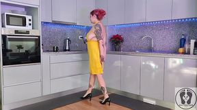 chubby waitress masturbates in the kitchen wearing an apron