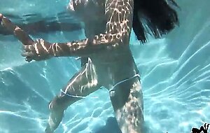 Brunette MILF Sofie Marie Dives In Pool To Play With Dildos