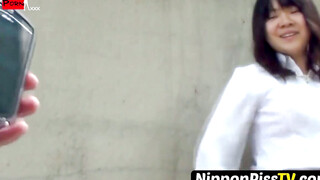 NipponPissTV.com - Naughty Japanese babe peeing outdoors for voyeur pleasure on camer