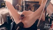Pup Jake gets remote fucked in a sling
