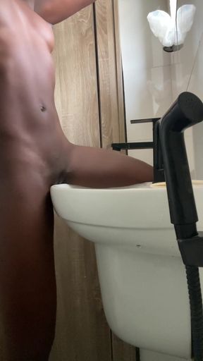 Hot ebony humping in toilet hand basin   Clip 1