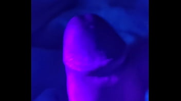ifoslave playing with his cock in blacklight and cums