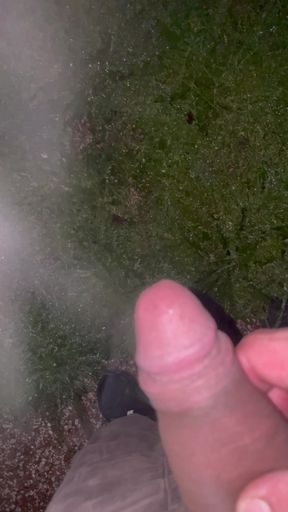 Pissing from steaming cock in the garden
