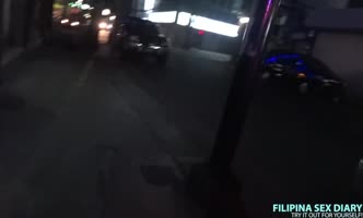 Asian Babe Seduces Tourist with Sultry Dance Moves