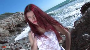 Nice Young Redhead Yara Doing a Hot Striptease in the Rocks
