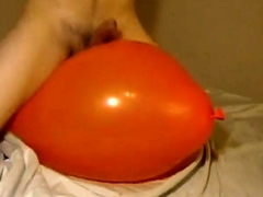 Big inflatable orange balloon humping cum