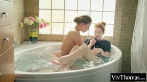 Sexy Kalisy gets extra wet in the bath with lesbian lover Adel C