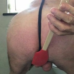 Beating tied cock and balls