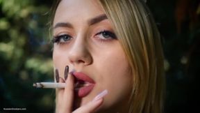 Hot Blonde Babe Smoking One Black Cigarettes in Nature