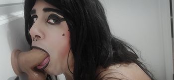 Goth Femboy loves tasting her dildo.