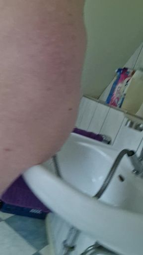 Fat sissy sow cleaning her pussy clean