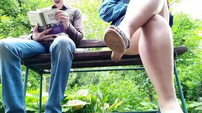 Busty lady in pantyhose urinates nearby in the park; view from below