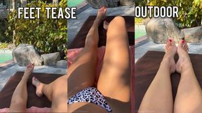 Feet tease outdoor while watching a movie