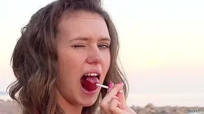 Kinky Lucy Dances Naked In The Beach And Masturbates With A Lollipop! - Andrea Tiffani Shegal
