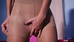 Blonde with long legs Kerry Bradshow is touching her wet snatch