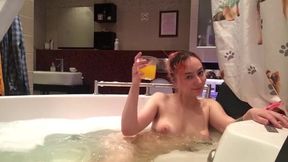 having fun in a jacuzzi w some juice :)