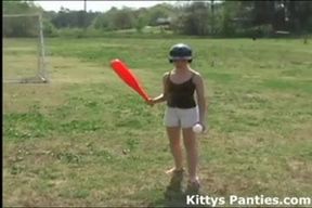 Innocent teen Kitty playing softball outdoors