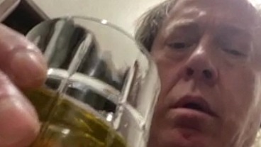 Drinking my piss out of a glass