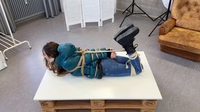 Rey Sanson bound and gagged in shiny nylon Down