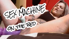 Sex Machine lying on the bed