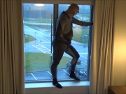 silicone masked wetsuited guy gets horny at hotel window and humps his pillows