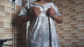 Cute girl slowly taking her dress