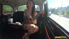 Tattooed babe seduces the taxi driver by showing off her tattooed body