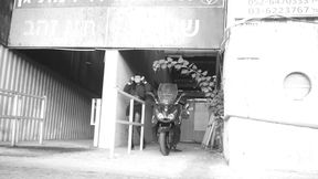 In Transparent Tights and a Transparent Dress She Poses for You.