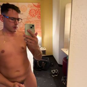 Sweet German boy jerks off early in the morning in the hotel room and squirts on the bed