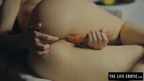 Lonely insane girl with nice tits masturbates to orgasm with a carrot