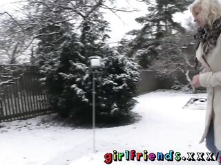 Girlfriends play in snow in advance of warming up with sexy lesbo sex