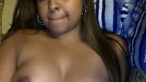 Cute and sexy brown skin sweetie flashes her boobs on webcam