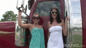 Seductive shapely ladies flash their butts and tits next to big trucks