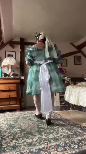 In a baby doll outfit with a diaper for a day