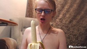 Astonishing stepmom uses a banana on her pussy
