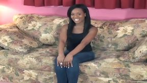 Seductive Ebony Babe Strips Naked on Couch Teasing Pussy